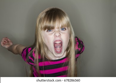 Unhappy Young Little Girl Yelling