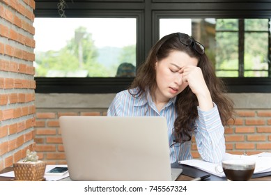 unhappy young woman using her smart phone.young business online marketing concept - Shutterstock ID 745567324