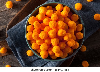 Unhealthy Cheesy Cheese Puffs In A Bowl