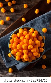 Unhealthy Cheesy Cheese Puffs In A Bowl