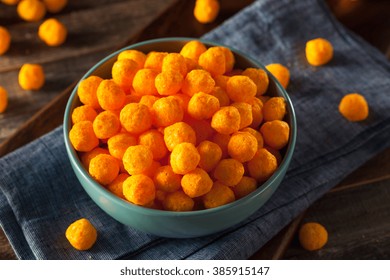 Unhealthy Cheesy Cheese Puffs In A Bowl