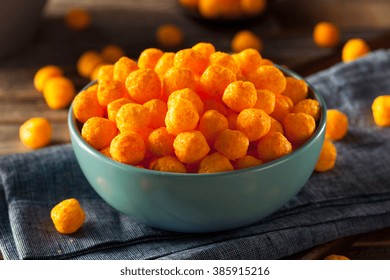 Unhealthy Cheesy Cheese Puffs In A Bowl