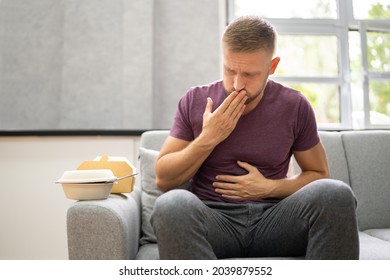 Unhealthy Fastfood Stomach Heartburn. Person After Eating Food