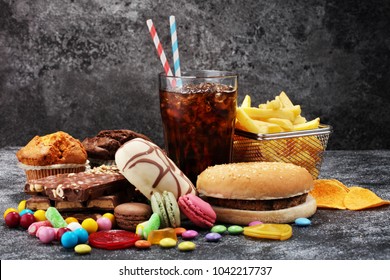 Unhealthy products. food bad for figure, skin, heart and teeth. Assortment of fast carbohydrates food.  - Shutterstock ID 1042217737