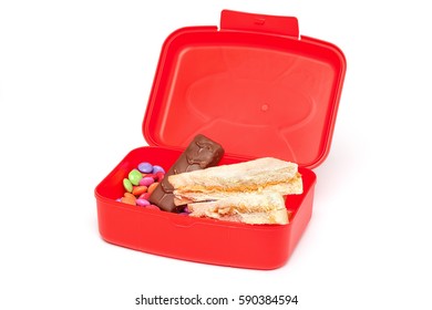 Unhealthy Red School Lunch Box, Isolated on White With White Bread and Sweets
