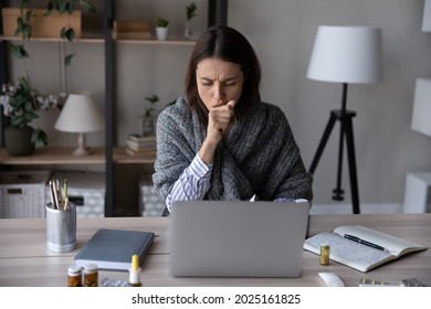 Unhealthy young Caucasian woman sit at desk at home office work online on computer suffer from covid-19 virus. Sick female busy at laptop cough struggle with coronavirus or flu at workplace. - Shutterstock ID 2025161825