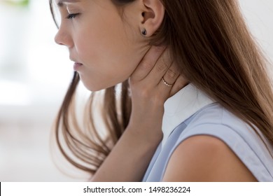 Unhealthy Young Woman Touch Neck Hard To Swallow Having Discomfort Or Painful Feeling, Unwell Sad Female Employee Suffering From Angina Or Tonsillitis, Sore Throat, Experience Loss Of Voice