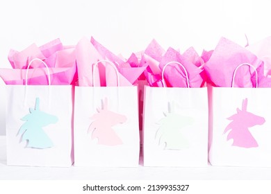 Unicorn Birthday party favor bags for a little girl's Birthday party. - Shutterstock ID 2139935327