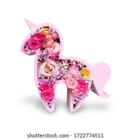 Unicorn Bouquet For Little Girls. Creative Floristry. Flowers In Soft Pink Colors. The Picture In The Style Of Minimalism. Isolated Object.