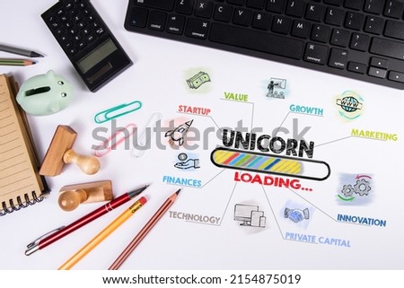 UNICORN, business concept. Computer keyboard on office desk.