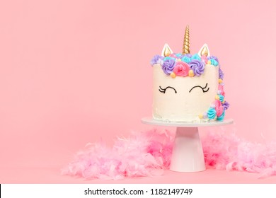 Unicorn cake decorated with multicolor buttercream icing.