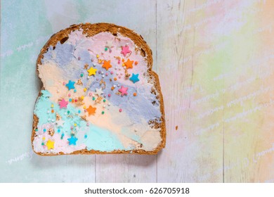 Unicorn Food Toasted Bread With Colorfur Cream Cheese With Stars And Gold