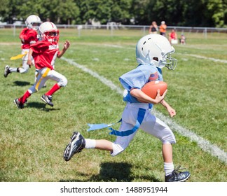 Unidentifiable Kids Playing Flag American Football