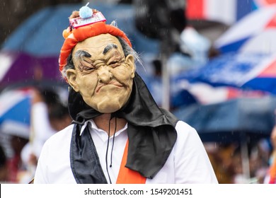 Unidentifiable Man Wearing Costume During Panama National Day Parade Celebrating The Separation Of Panama From Colombia. Selective Focus. Person Wearing Mask.