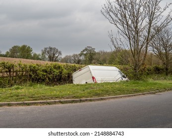 Unidentifiable White Van In Ditch, Abandoned By Driver. UK.