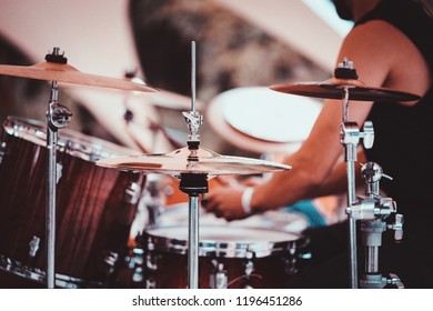 Unidentified Drummer Playing On Drum Kit. Close Up Of Play Drums. Drum Player Kick Drum Plate. Man Playing Drums Music