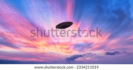 An Unidentified Flying Object Saucer Is Hovering In The Colored Surreal Sky