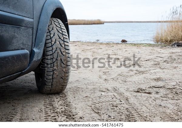 Unidentified offroad vehicles during a desert safari\
on the sand