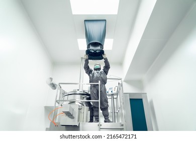 The Unidentified Operator Is Using The Capture Hood Balometer To Measuring The Air Velocity And Volume Of Supply Air From HVAC System In The Clean Room.