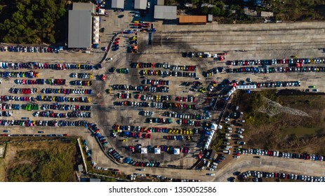 Unidentified people walking at car care shop and Automotive services in speed race track,  Crowd of people queue to pay at cars show