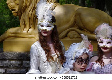 An unidentified persons in a carnival costumes. TALLINN, ESTONIA MAY 2016: Venetian Carnival