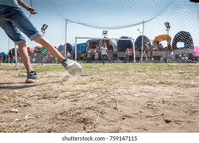 Unidentified Turkish Man Hitting Ball To Win Gift If He Scores A Goal To Woman Goal Keeper At Pavli Fair Festival In Kirklareli,Turkey 19 October,2017