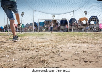 Unidentified Turkish Man Hitting Ball To Win Gift If He Scores A Goal To Woman Goal Keeper At Pavli Fair Festival In Kirklareli,Turkey 19 October,2017