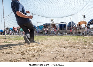 Unidentified Turkish Man Hitting Ball To Win Gift If He Scores A Goal To Woman Goal Keeper At Pavli Fair Festival In Kirklareli,Turkey 19 October,2017