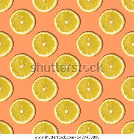 Uniform pattern of lemon slices with shadow on a peach trendy background. Flat layout.