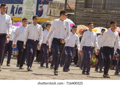 Uniformed In Blue, High School Teens March During Honduras Independence Day Parade At The Town Of La Lima On September 15,2017. 