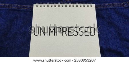 Unimpressed Expression on notebook : Concept of Disinterest and Indifference. 