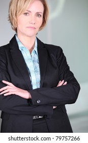 Unimpressed Woman With Her Arms Folded