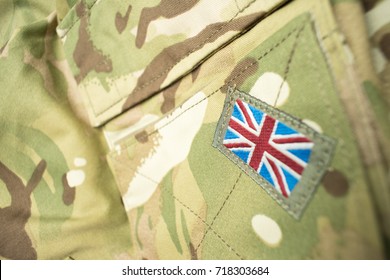 Union Jack / Union Flag Badge On A British Army Camouflage Uniform. Potential Text / Writing / Copy Space Around Badge.
