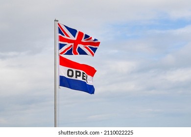 Union Jack Flag Flying Asbove A French Flag With Open Written On It. No People, Copy Space.