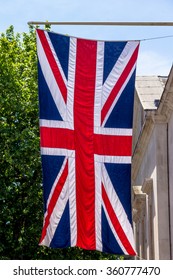 The Union Jack Flag Flying From A Flag Pole On The Mall Street. London.  England.  UK.  