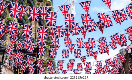 Union Jack flags hanging at the street ready to national holiday celebration - Shutterstock ID 2292156259