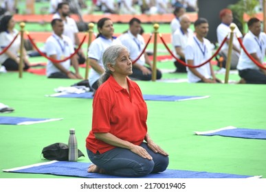 Union Minister Nirmala Sitaraman Performs Yoga During A Mass Yoga Session At The Jantar Mantar On The International Day Of Yoga In New Delhi , June 21 , 2022