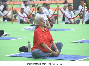 Union Minister Nirmala Sitaraman Performs Yoga During A Mass Yoga Session At The Jantar Mantar On The International Day Of Yoga In New Delhi , June 21 , 2022