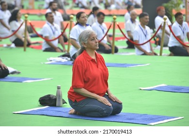 Union Minister Nirmala Sitaraman Performs Yoga During A Mass Yoga Session At The Jantar Mantar On The International Day Of Yoga In New Delhi , June 21 , 2022