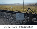 Union Pacific Railroad Private Property No Trespassing Sign -Train Tracks in Utah Desert Landscape - Cargo Freight Transportation Industry