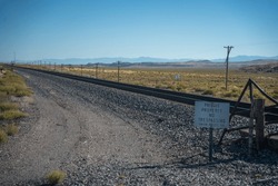 Union Pacific Railroad Private Property No Trespassing Sign -Train Tracks In Utah Desert Landscape - Cargo Freight Transportation Industry