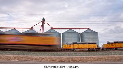 Union Pacific Train is passing through this small agriculture town