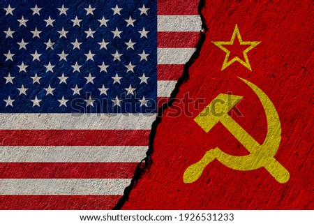 union states and soviet union flags painted on concrete wall