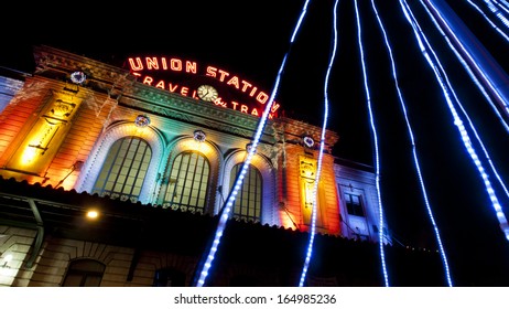 Union Station decorated with light for Christmas.