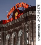 Union Station train station sign in Denver at sunset