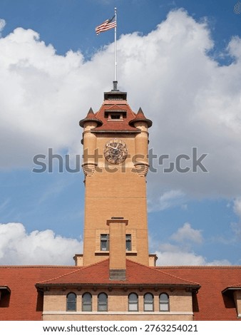 Union Train Station Clock Tower, Springfield Illinois, Historic Landmark with Blue Sky and American flag
