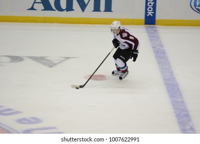 UNIONDALE, NEW YORK, UNITED STATES – FEB 8, 2014: NHL Hockey: Matt Duchene, Of The Colorado Avalanche, Skates With The Puck In A Game Against The New York Islanders At Nassau Coliseum. 