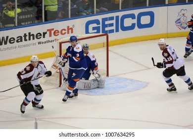 UNIONDALE, NEW YORK, UNITED STATES – FEB 8, 2014: NHL Hockey: Paul Stastny #26 And Nathan MacKinnon #29, Of The Colorado Avalanche, Press The Play Against  The New York Islanders At Nassau Coliseum.