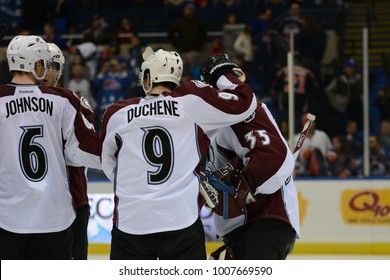 UNIONDALE, NEW YORK, UNITED STATES – FEB 8, 2014: NHL Hockey: Colorado Avalanche Players Celebrate After Defeating The New York Islanders At Nassau Coliseum. Erik Johnson, Matt Duchene.