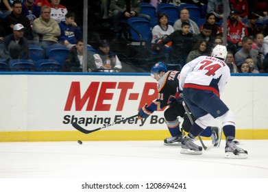 UNIONDALE, NEW YORK, UNITED STATES – March 9, 2013: NHL Hockey: John Carlson Of The Washington Capitals, And John Tavares Of The New York Islanders During A Game At Nassau Coliseum.